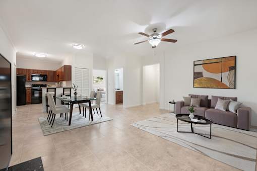 A modern living room with a dining table and a couch.