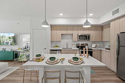 Kitchen Island With Pendent Lights at The Palmeri Residences, Naples, Florida