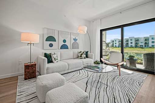A Living Room with a White Sofa at The Palmeri Residences, Florida, 34104