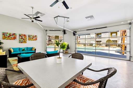 A White Dining Table at Flats on Chapel Apartments, Waco, TX
