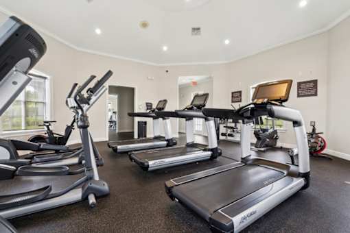 Free weights and fitness equipment in the 24 hour gym at Ballantrae Apartments