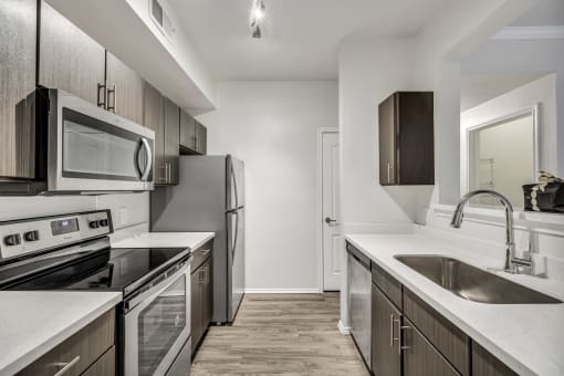 Deluxe Kitchen with Stainless Steel Appliances at River Stone Ranch, Austin