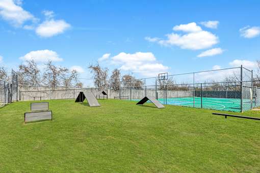 Dog Play Area at Flats on Chapel Apartments, Waco