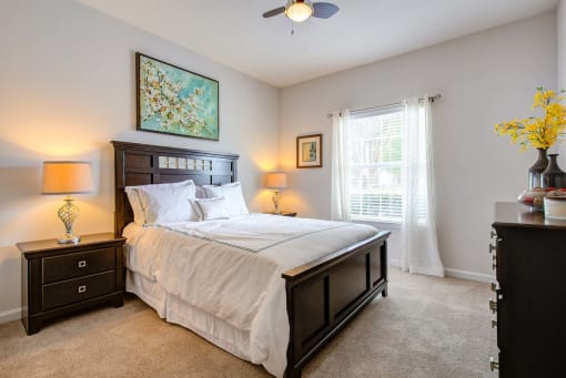 a bedroom with a bed and a ceiling fan at Thornberry Apartments, North Carolina