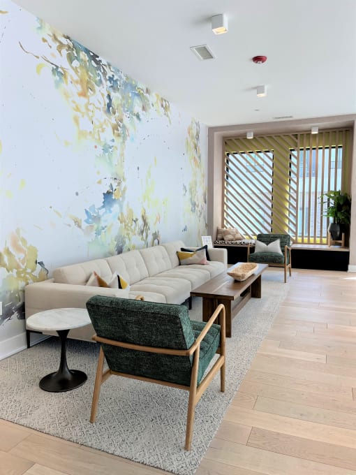Common area seating with window seat at The Maven, Georgia, 30024