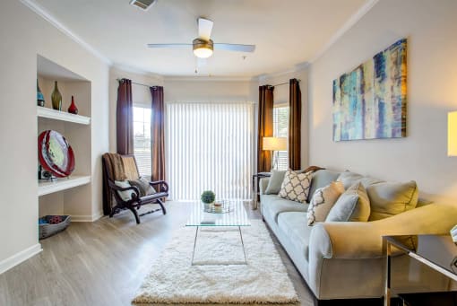 a living room with a couch and a coffee table at Thornberry Apartments, Charlotte, 28262