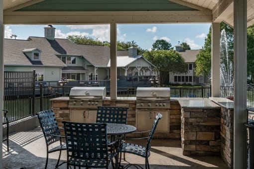 Community grills and covered lounge at Saddleworth Green, Ocala, FL