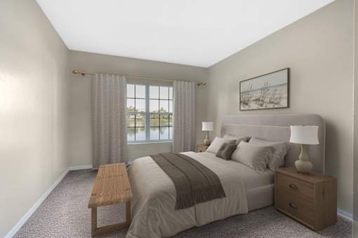 Large bedroom with a water view
