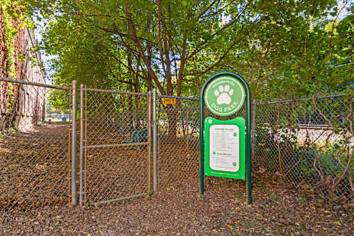 A fenced in dog park area