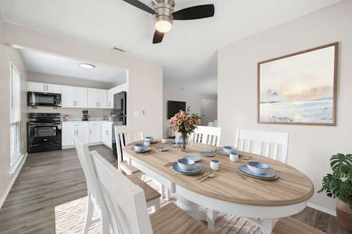 A modern dining room with a wooden table set for six.