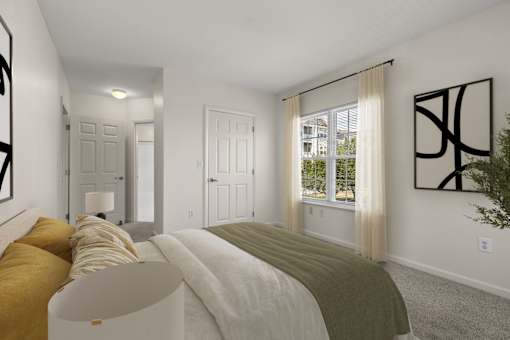 A bedroom with a large bed and a window with curtains.