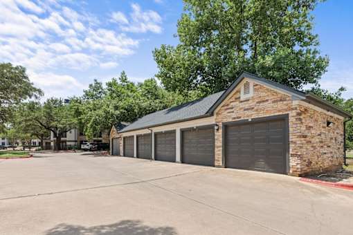 A house with a garage and a driveway.