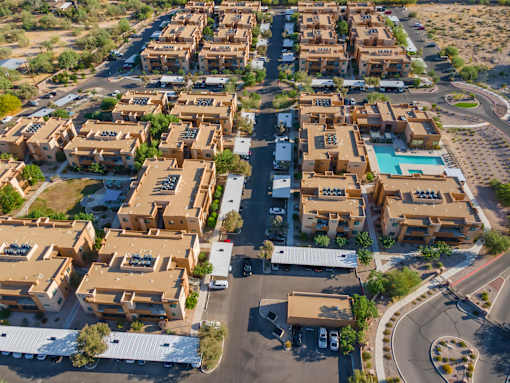 A large complex of houses with a roundabout in the middle.