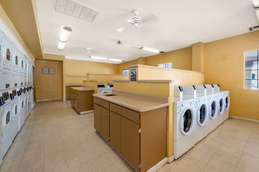 A laundromat with washers and dryers.