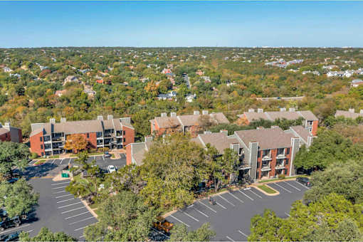 Large building with a parking lot at Great Hills, Austin, TX 78759  