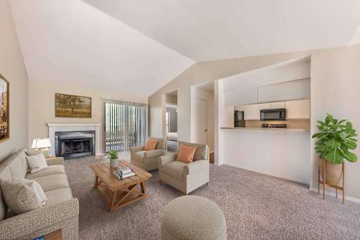 Living room with a fireplace and couches at Great Hills, Austin, TX