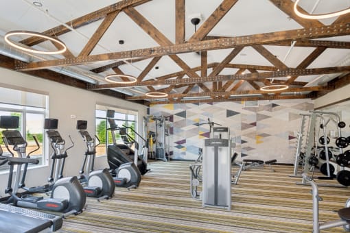 a fully equipped fitness center at SoRoc on Maine in Rochester, MN