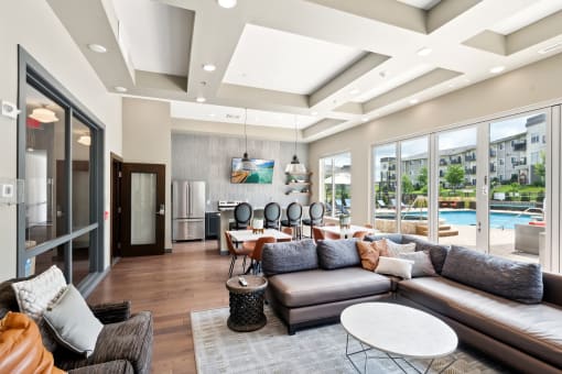an open layout clubhouse with large doors at SoRoc on Maine in Rochester
