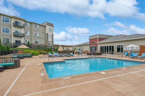 a resort-style swimming pool and spa at SoRoc on Maine in Rochester, MN