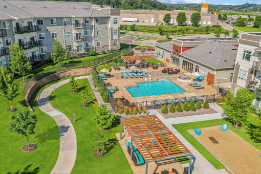 an aerial view showing the pool at SoRoc on Maine apartments in  Rochester, MN