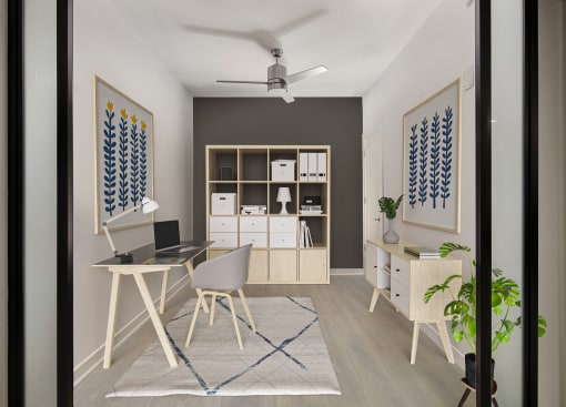 a home office with a white desk and white chairs with a blue and white rug at SLX Atlanta, Chamblee, Georgia