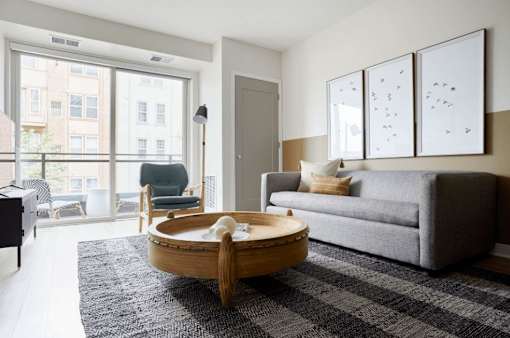 Furnished Living room with couch at Revel, Minneapolis, Minnesota