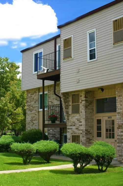 a house with a balcony on the side of it