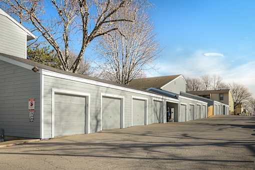 A row of garage doors are closed.