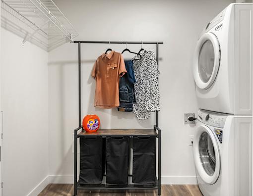 A Laundry Room at Podium Apartments, Calgary, T2E 7J2