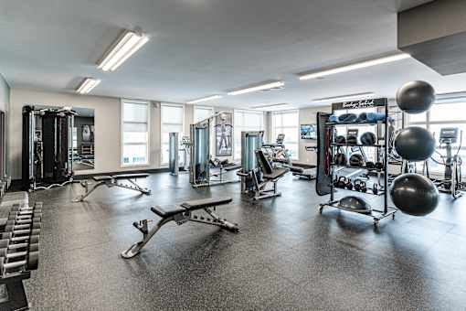 A Gym With Equipment at Podium Apartments, Calgary, AB, T2E 7J2