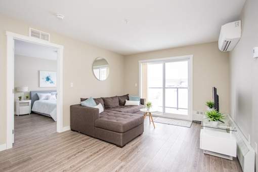 Interior - wide shot of living room and bedroom