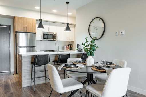 A Dining Table Set For Four at Cadence at Griesbach, Edmonton, AB