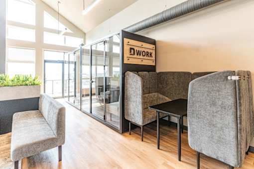 A room with a sign that says "DWORK" on the wall.