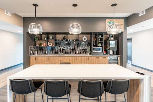 A Long Table and Chairs at Cadence at Griesbach, Edmonton, T5E 1Y8
