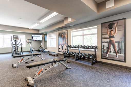 A Gym With Dumbbells at Cadence at Griesbach, Edmonton, T5E 1Y8