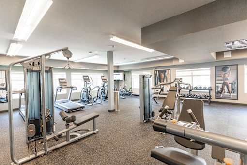 A Gym With Exercise Machines at Cadence at Griesbach, Edmonton
