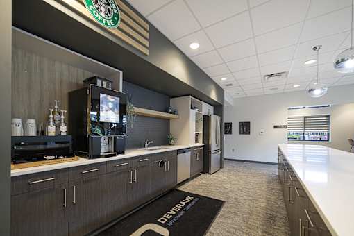 Starbucks coffee machine on a counter.