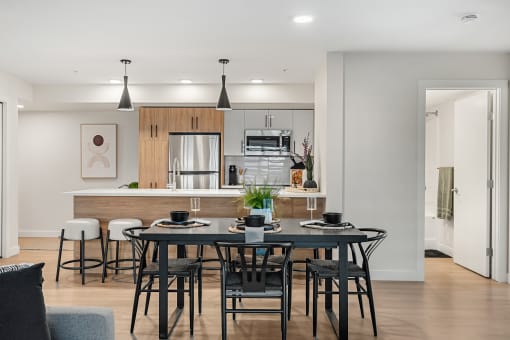 a rendering of a dining room with a table and chairs