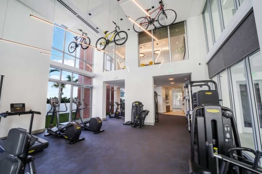 Quantum Apts gym with ample cardio and weight training equipment