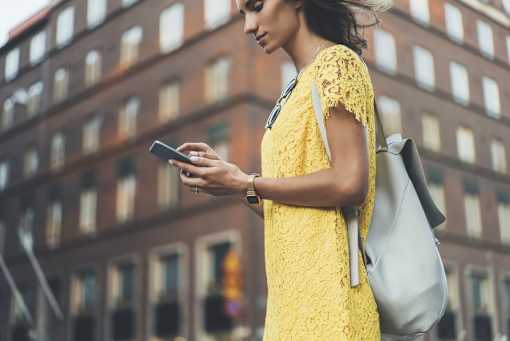 Woman in yellow dress walking