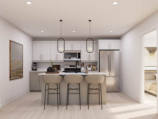 A modern kitchen with a dining table and chairs.