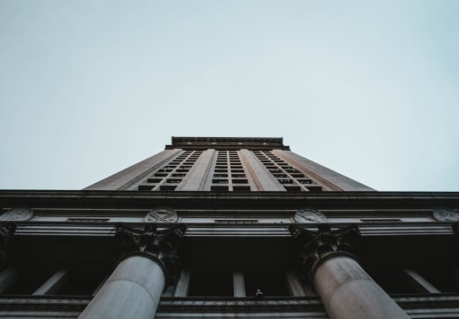 a tall building with the sky in the background