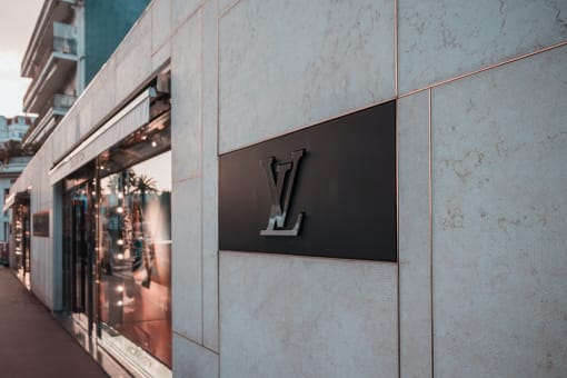 the v logo on the side of a building