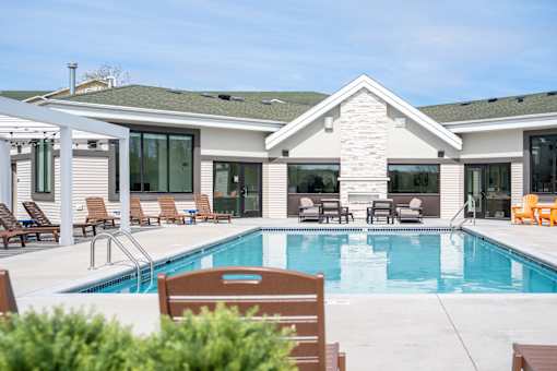 A house with a pool in the backyard.