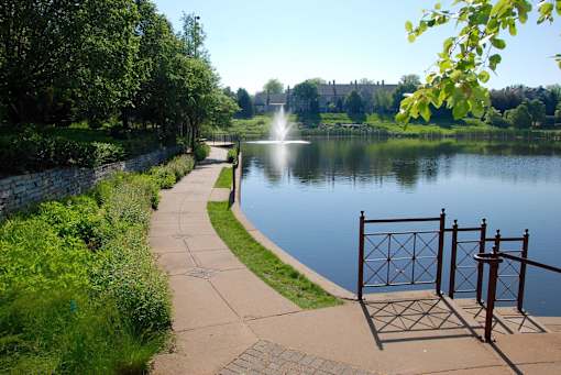 Walking Trail next to Pond with Fountain