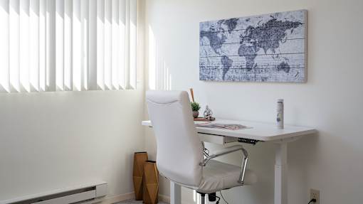 a desk with a chair in a home office at The Bosk Apartment Homes, Minnesota 55125