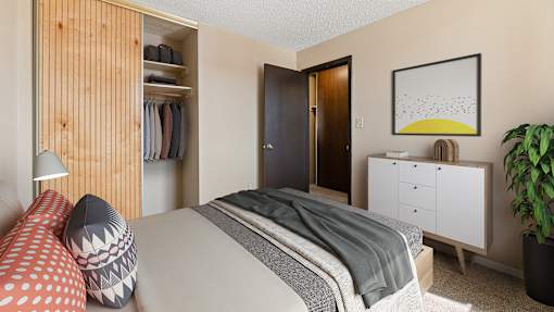 a bedroom with a bed and a closet