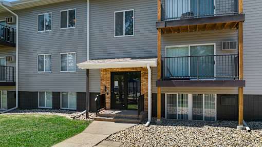 a building with a front porch and a glass door