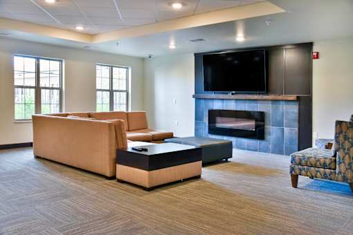Community Room with Large TV and Couches