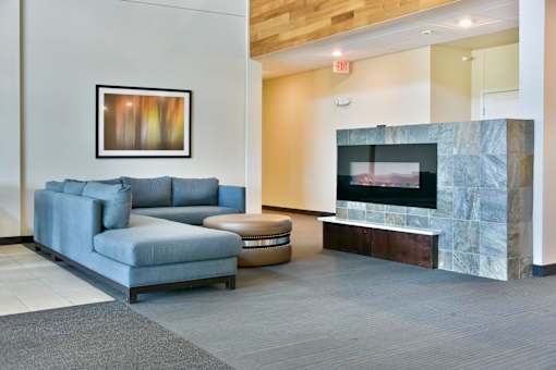 Lobby Lounge with Couch and Fireplace